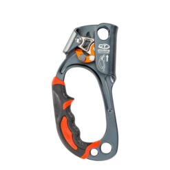 Das Bild zeigt die Climbing Technology Quick Up Steigklemme für die linke Hand von der Innenseite. Man sieht in Bildmitte die graue Steigklemme mit dem Klemmechanismus oben und dem Gummigriff links unten.