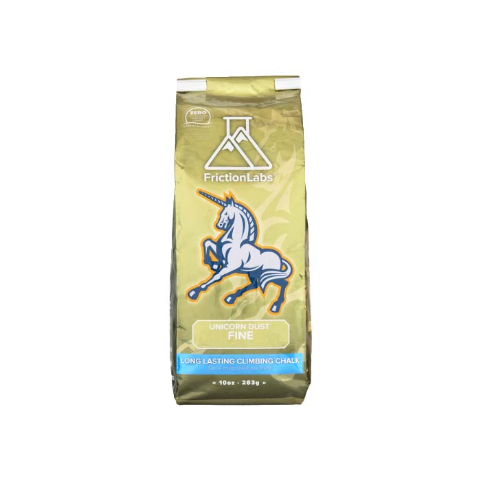 Das Bild zeigt eine goldene Packung Frictionlabs Unicorn Dust Chalk. Man sieht die aufrecht stehende Packung von der Vorderseite mit dem Logo, dem Einhorn und dem Produktnamen darunter.