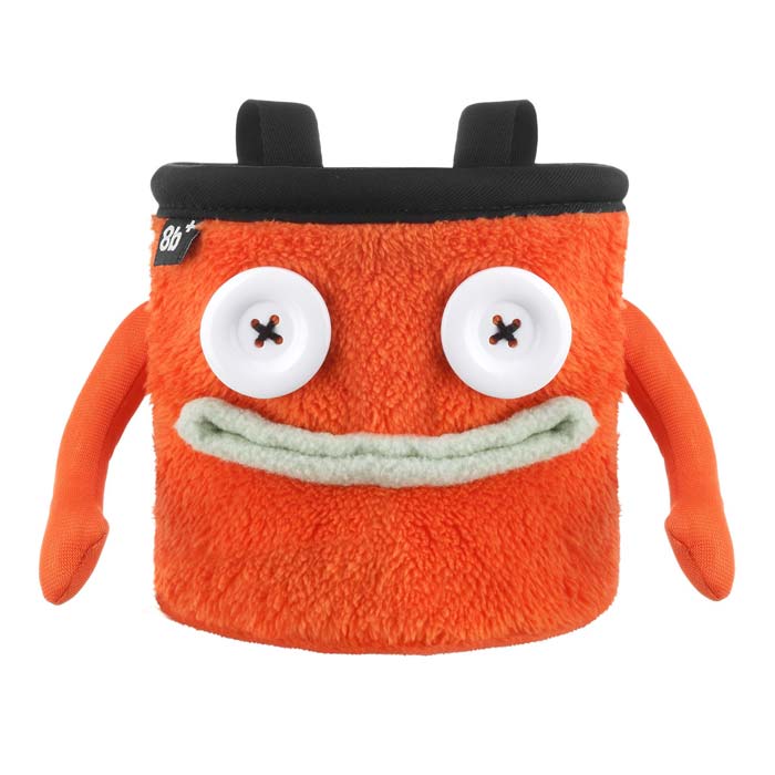 Das Bild zeigt das Chalkbag Monster Floyd von vorne. Der orange, lustige Magnesiumbeutel hat zwei Knöpfe als Augen und einen grauen Mund sowie zwei seitliche Arme.