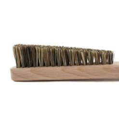 Das Bild zeigt einen Kopf einen Kletter Griffbürste mit schrägen Borsten.