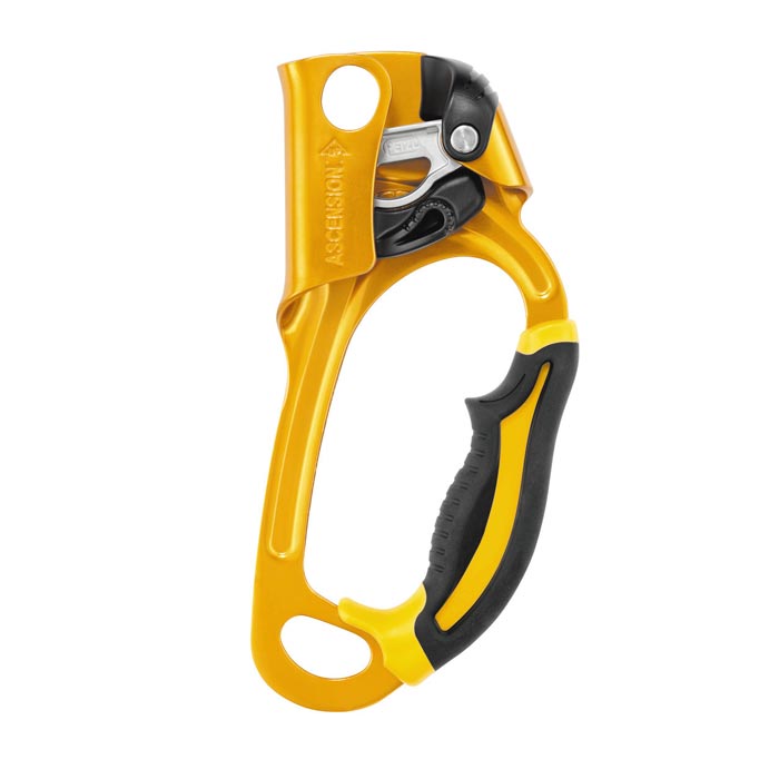 Das Bild zeigt die gelbe Petzl Ascension Handsteigklemme. MAn sieht die gesamte Innenseite mit Griff, Klemmnocken, Fixierhebel und Karabinerösen.