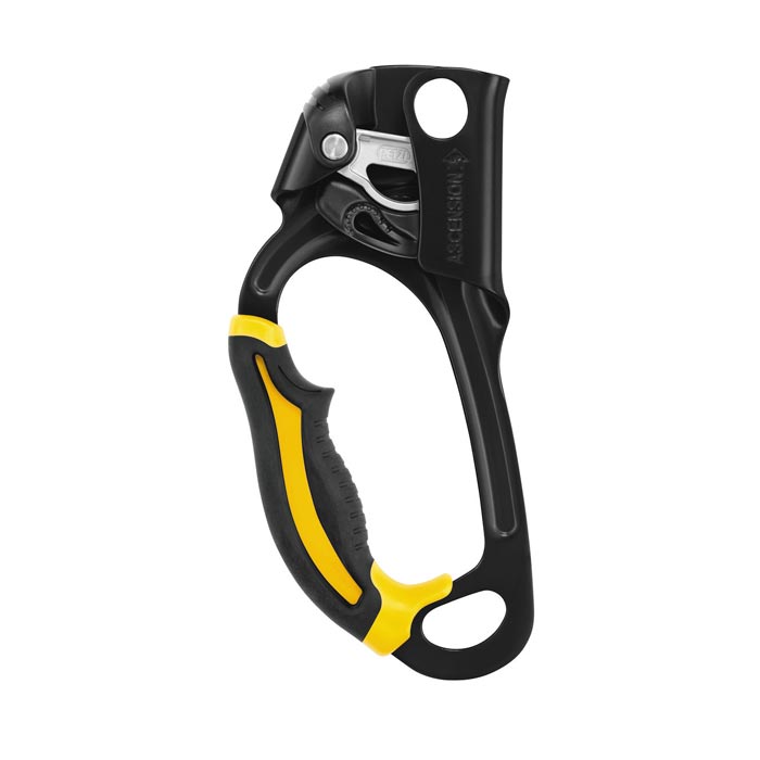 Das Bild zeigt die schwarze Petzl Ascension Handsteigklemme. MAn sieht die gesamte Innenseite mit Griff, Klemmnocken, Fixierhebel und Karabinerösen.